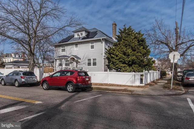 a cars parked in front of a house