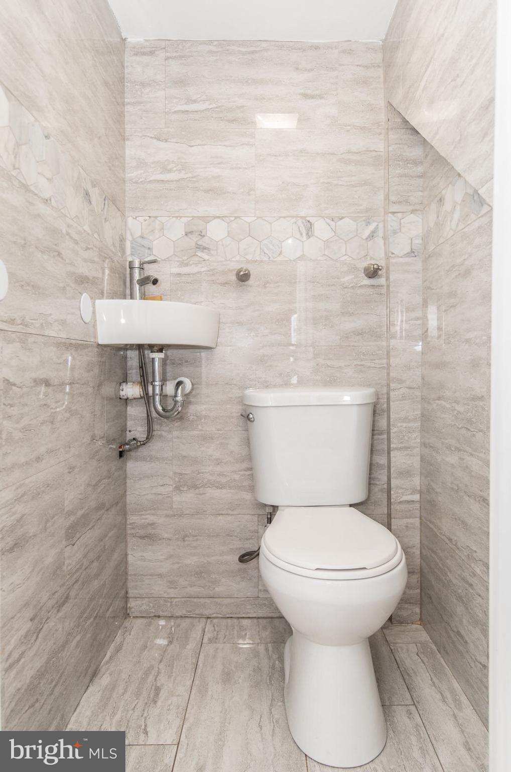 7400 Claridge Street Philadelphia, PA 19111 - Photo 14 of 43 a bathroom with a toilet