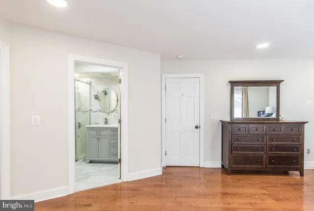 a view of room with mirror