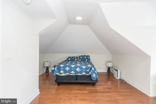a view of a bathroom from a hallway