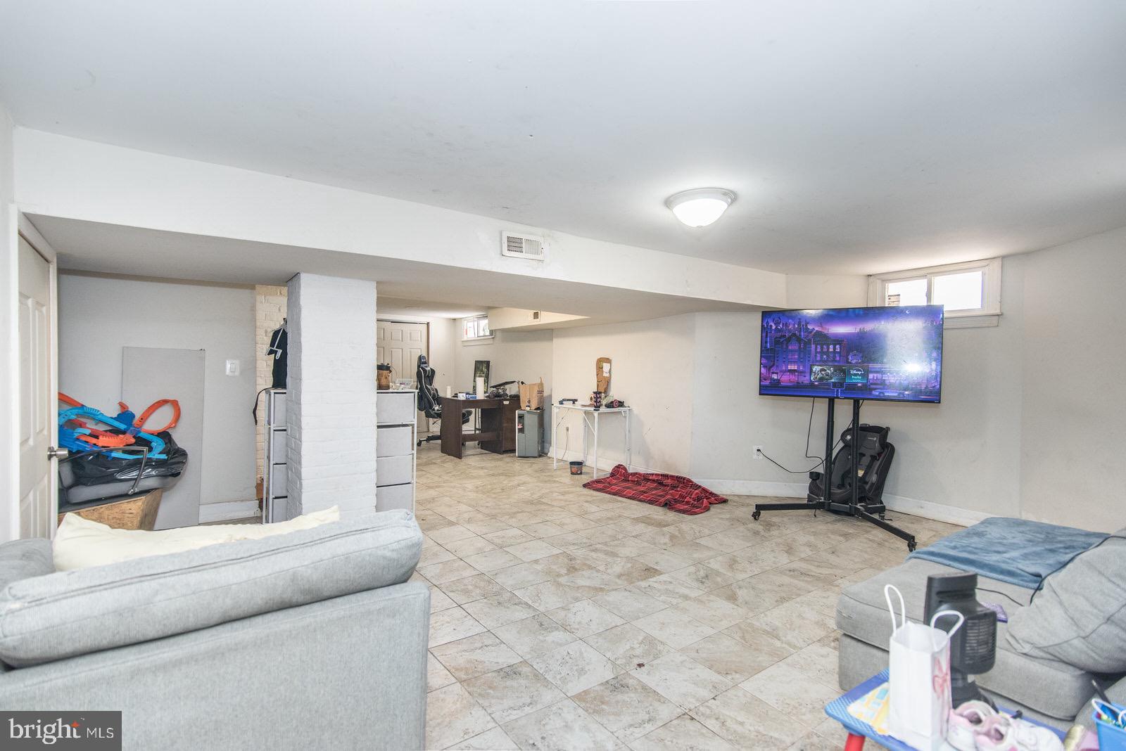 7400 Claridge Street Philadelphia, PA 19111 - Photo 34 of 43 a bedroom with furniture and a flat screen tv