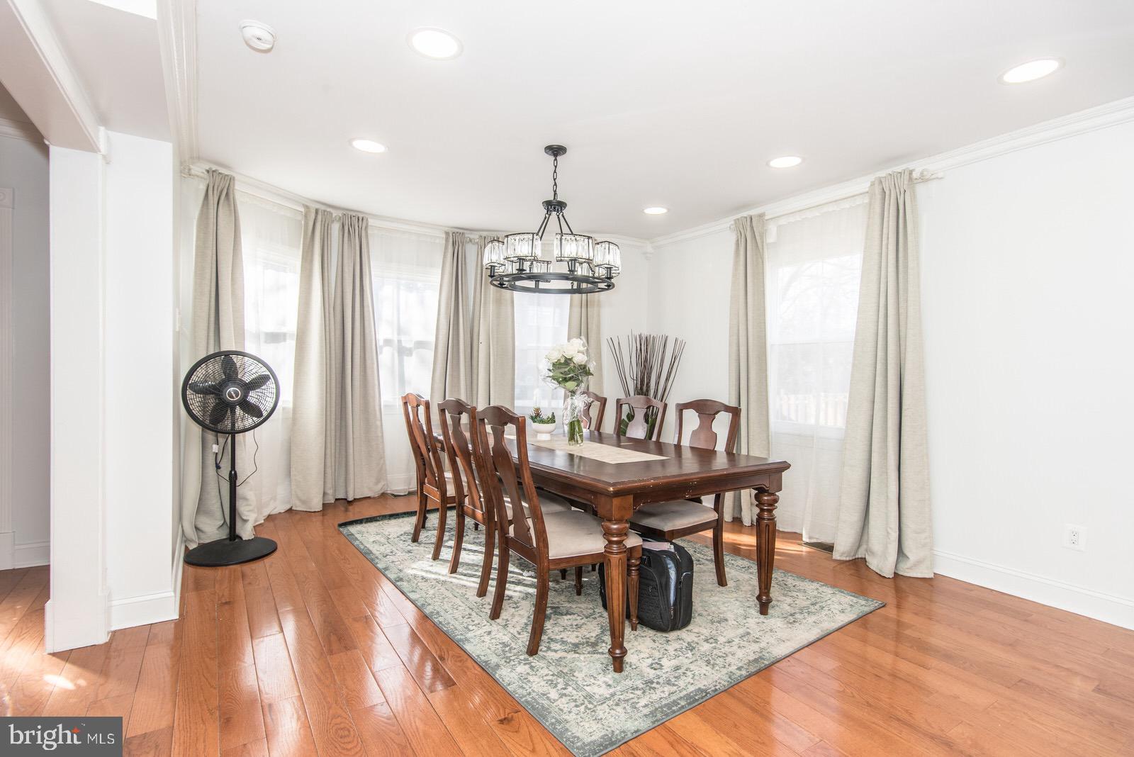 7400 Claridge Street Philadelphia, PA 19111 - Photo 8 of 43 a view of a dining room with furniture wooden floor and chandelier