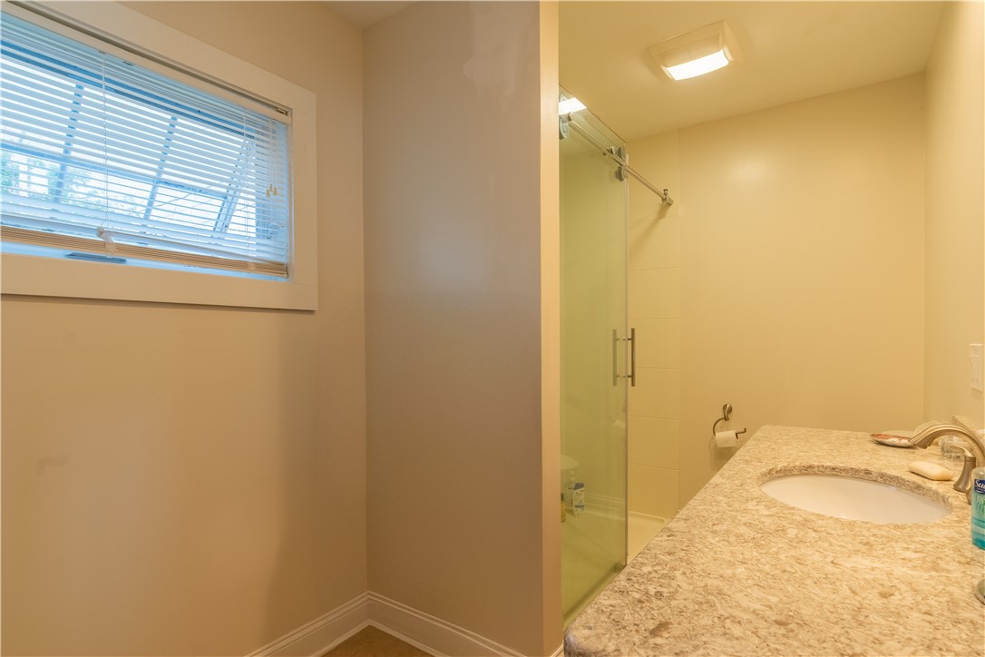 3533 Pebble Beach Road Livonia, NY 14480 - Photo 15 of 25 Full bath located behind the kitchen area, light a