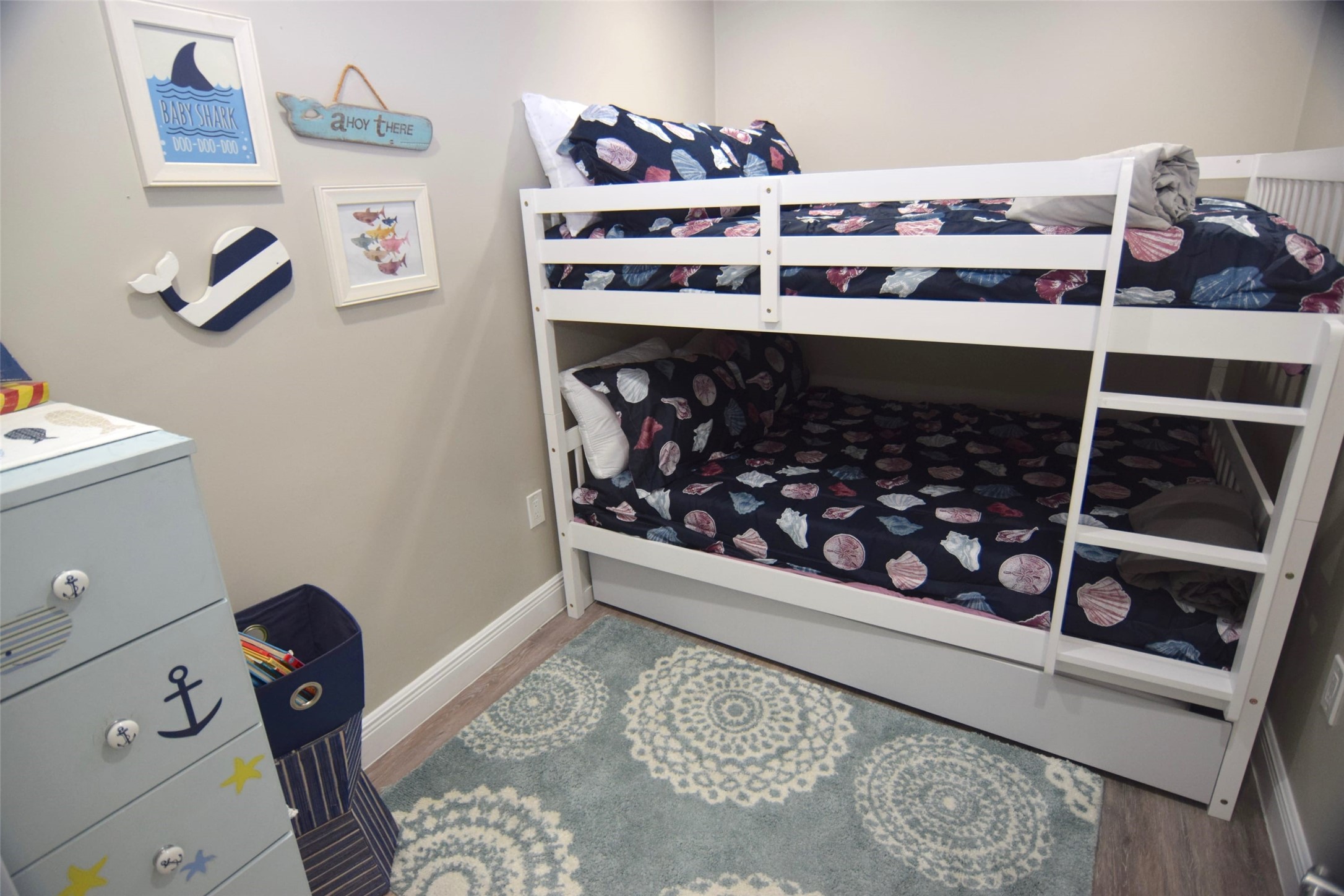 101 Pelican Place, Unit 4 Surfside Beach, TX 77541 - Photo 16 of 25 FIRST Bedroom with Queen Bunks and Twin Trundle Underneath