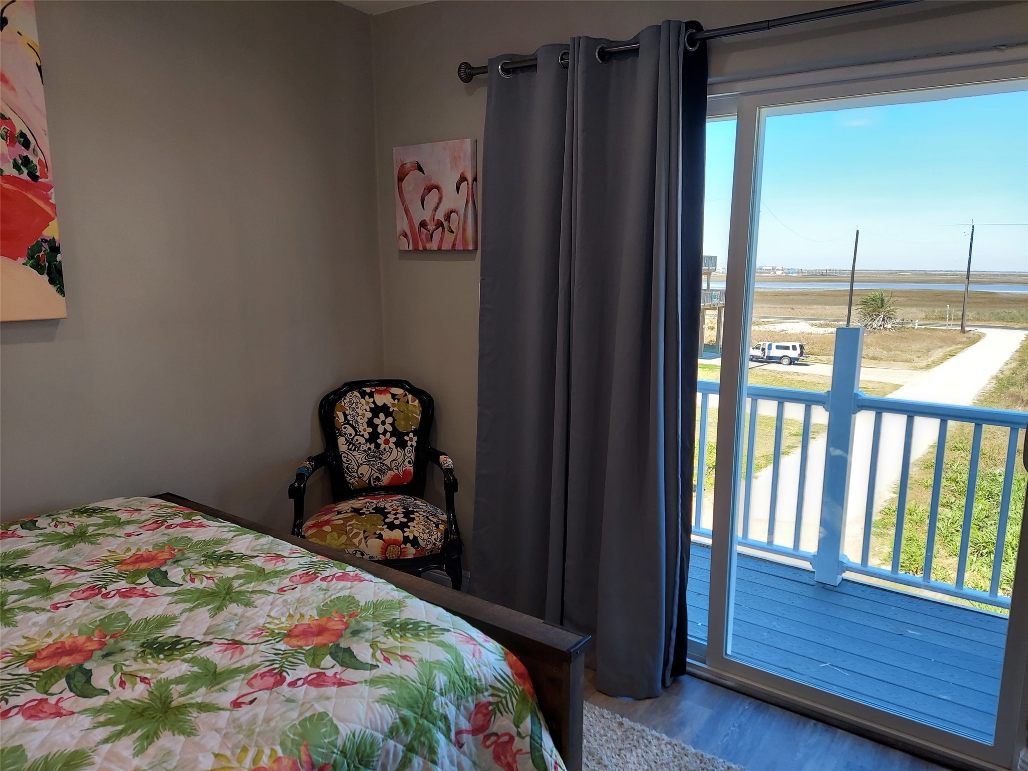 101 Pelican Place, Unit 4 Surfside Beach, TX 77541 - Photo 20 of 25 Queen Bedroom-Private Balcony with Swan Lake Views!