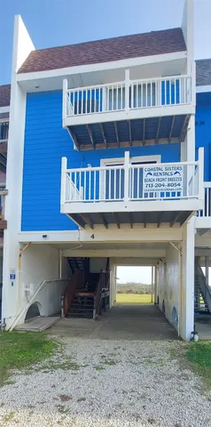 a view of a balcony with an ocean view