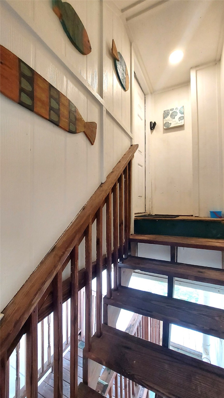 101 Pelican Place, Unit 4 Surfside Beach, TX 77541 - Photo 5 of 25 Follow the Covered Staircase to Front Door