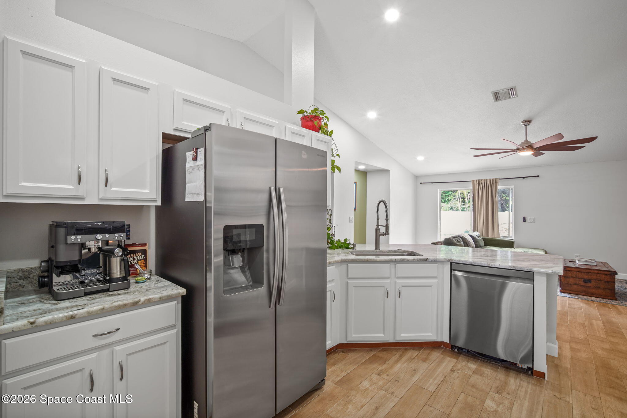 7735 Fringe Place Cocoa, FL 32927 - Photo 14 of 50 14-web-or-mls-FRINGE_KITCHEN18