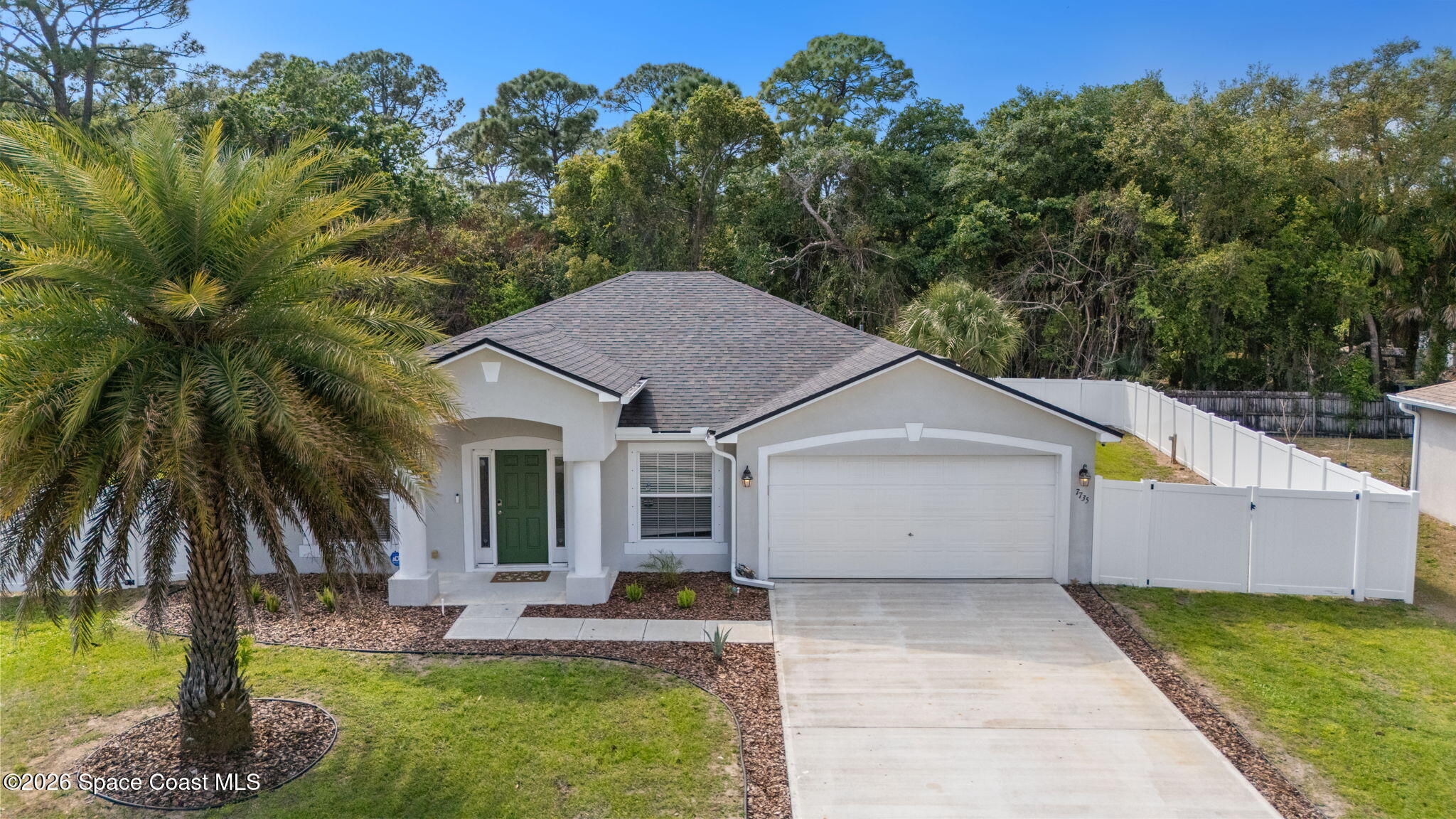 7735 Fringe Place Cocoa, FL 32927 - Photo 2 of 50 2-web-or-mls-FRINGE_DRONE8