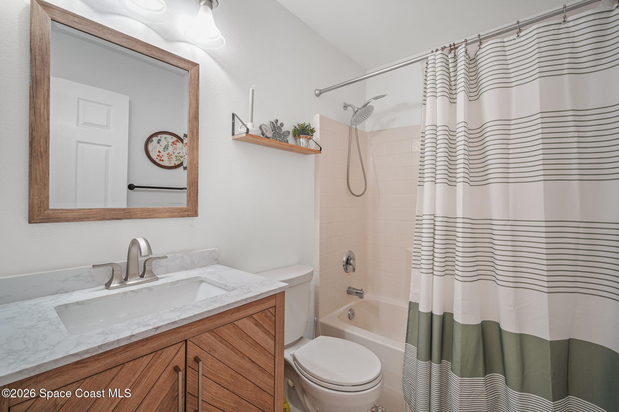 7735 Fringe Place Cocoa, FL 32927 - Photo 32 of 50 32-web-or-mls-FRINGE_BATHROOM3