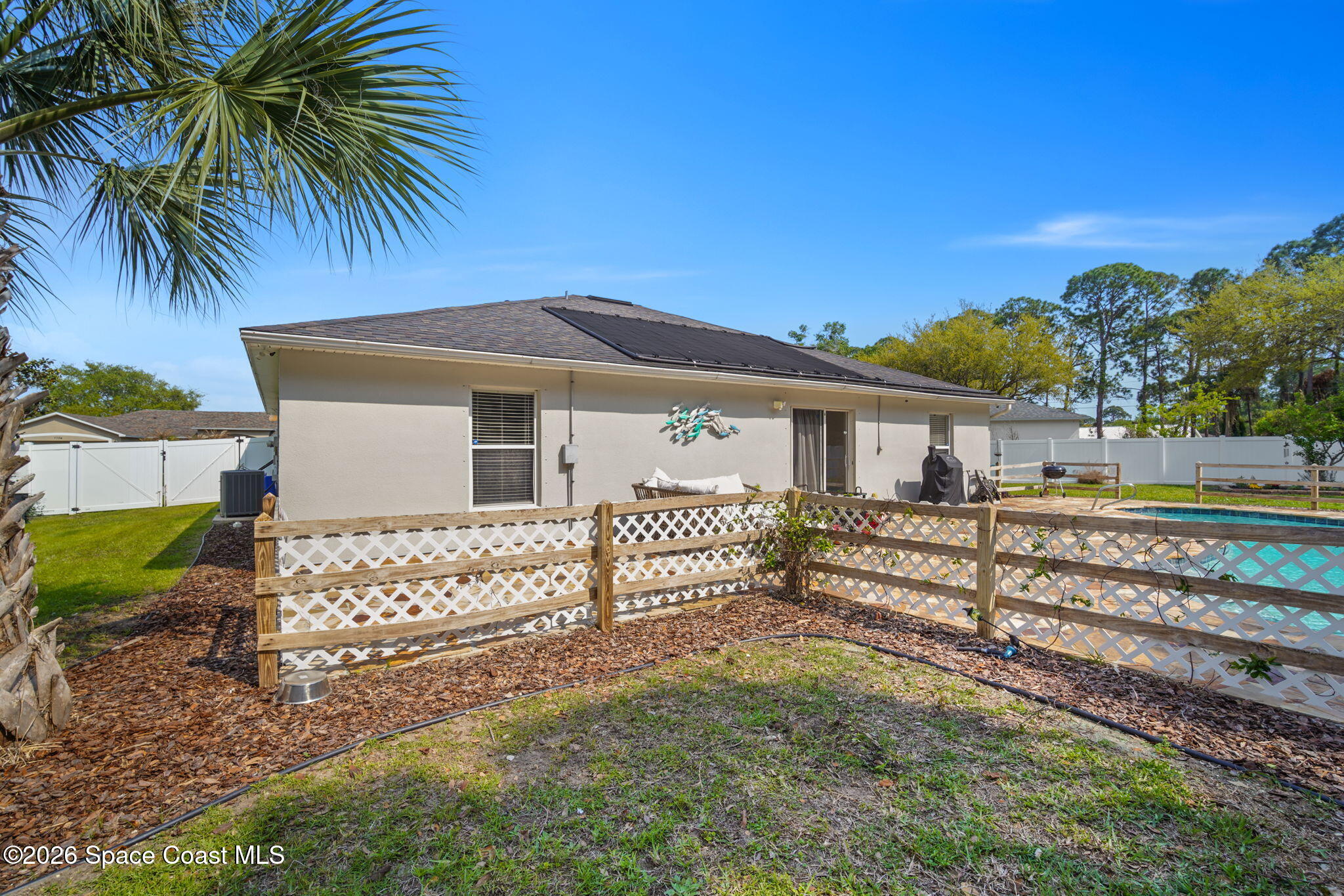 7735 Fringe Place Cocoa, FL 32927 - Photo 38 of 50 38-web-or-mls-FRINGE_BACK6
