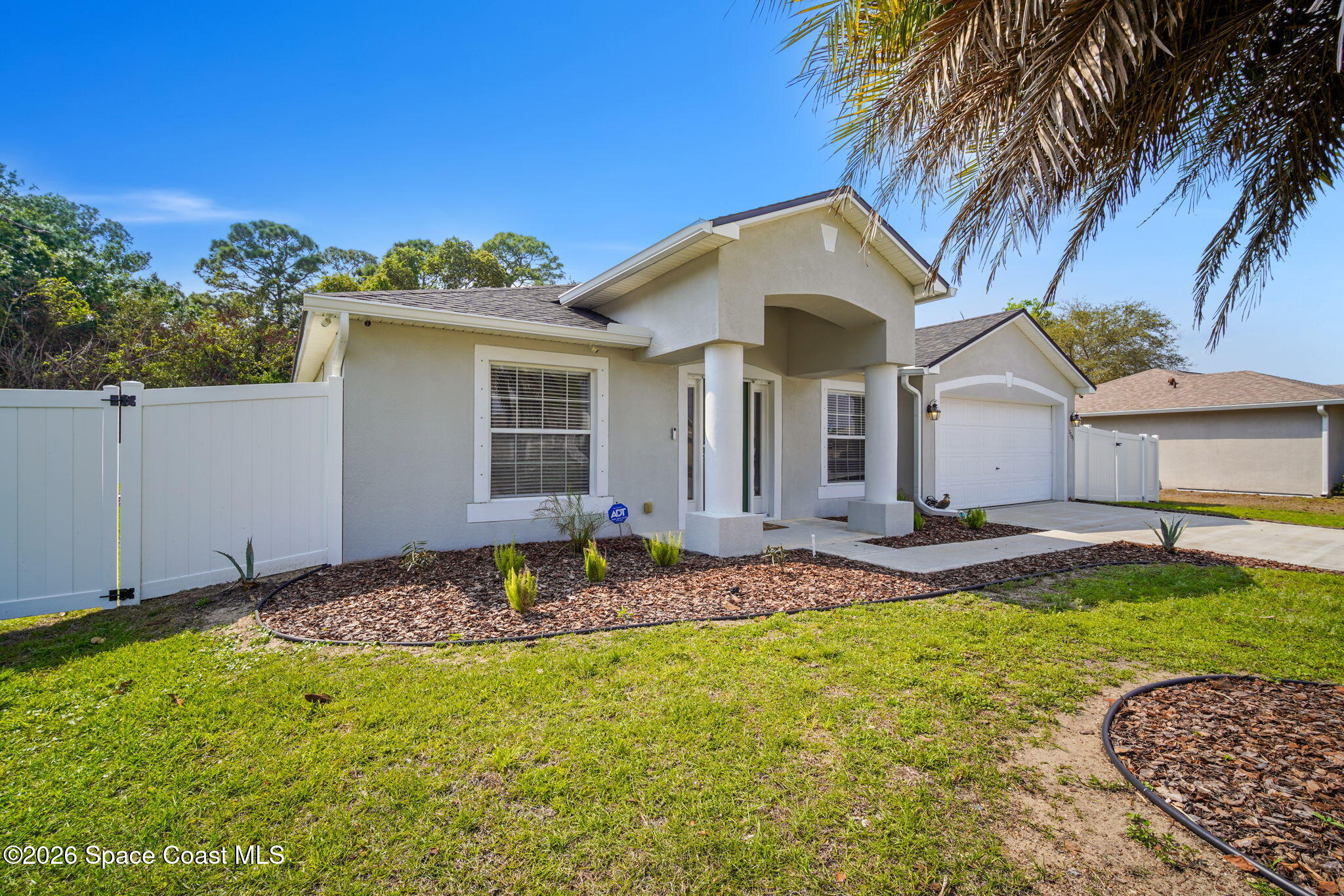 7735 Fringe Place Cocoa, FL 32927 - Photo 4 of 50 4-web-or-mls-FRINGE_FRONT4