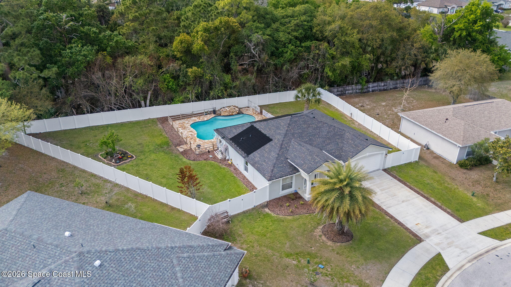 7735 Fringe Place Cocoa, FL 32927 - Photo 43 of 50 43-web-or-mls-FRINGE_DRONE9