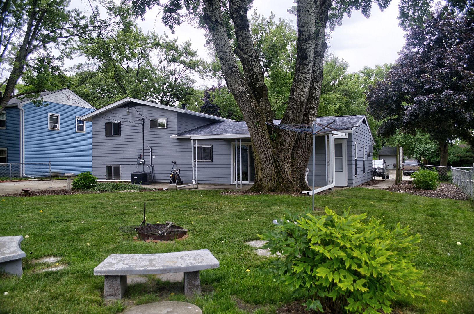 530 Redwood Road Bolingbrook, IL 60440 - Photo 25 of 33 a front view of a house with a yard and fence