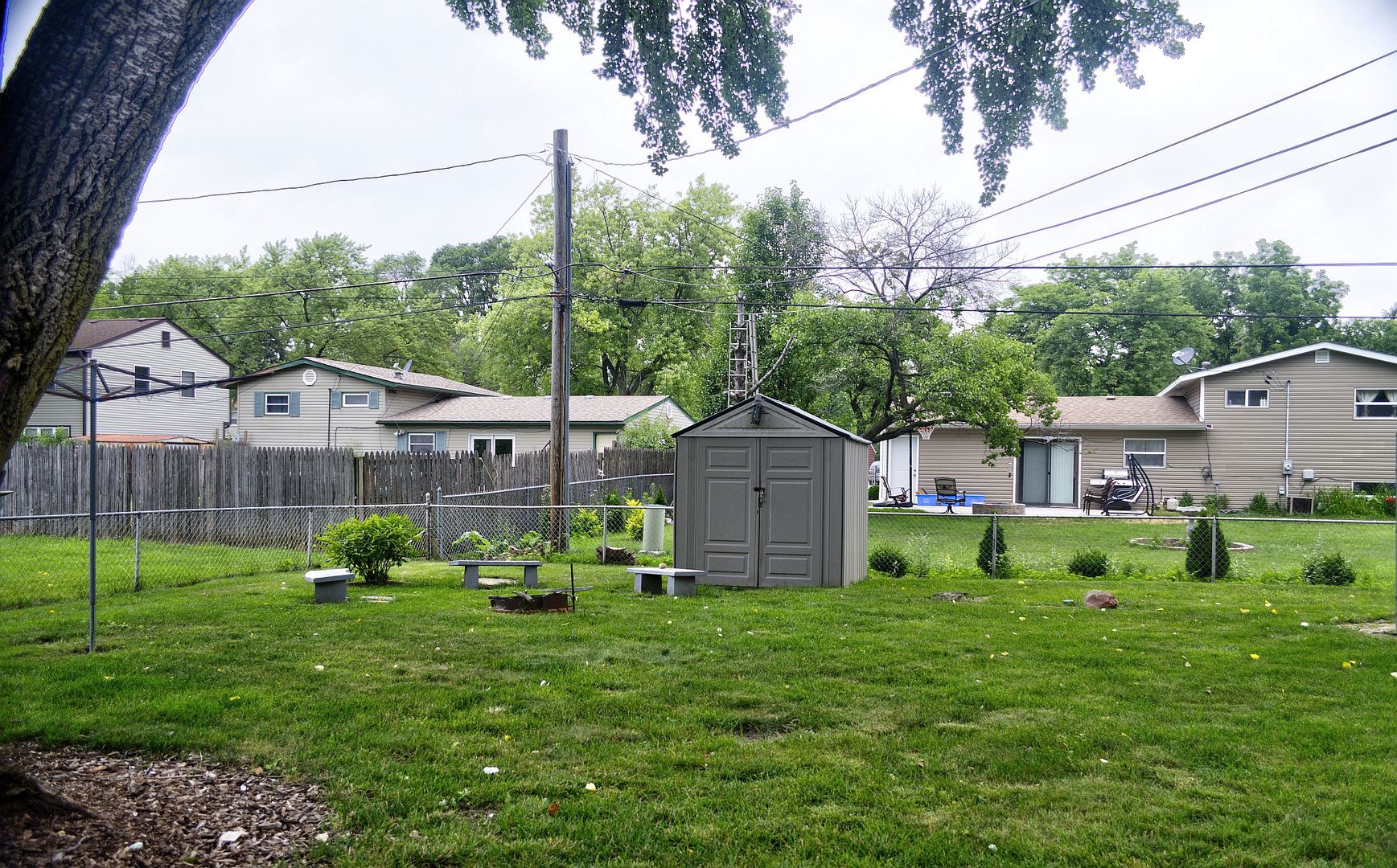 530 Redwood Road Bolingbrook, IL 60440 - Photo 27 of 33 a small garden in the middle of a yard
