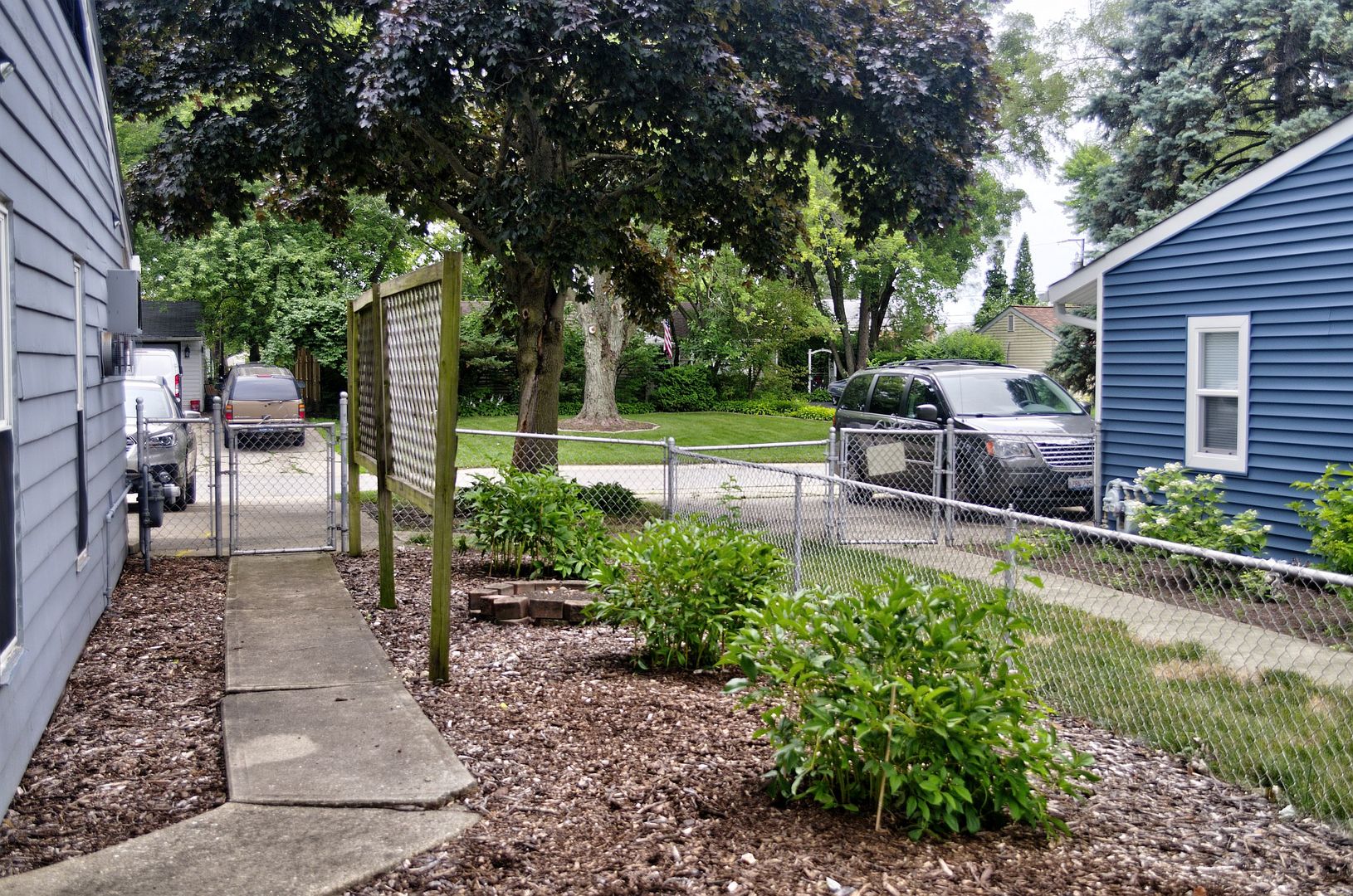 530 Redwood Road Bolingbrook, IL 60440 - Photo 29 of 33 a view of a backyard with sitting area and garden