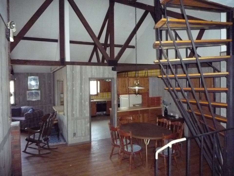 95 Slope Road Tolland, MA 01034 - Photo 11 of 18 a view of a livingroom with furniture and staircase