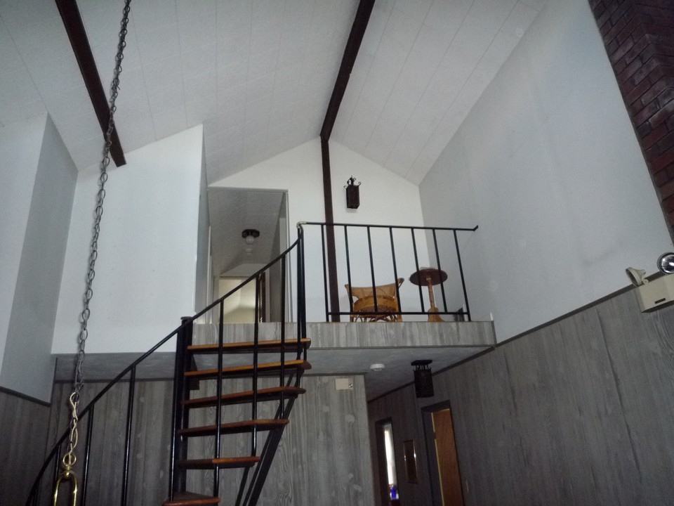 95 Slope Road Tolland, MA 01034 - Photo 16 of 18 a view of entryway with wooden floor