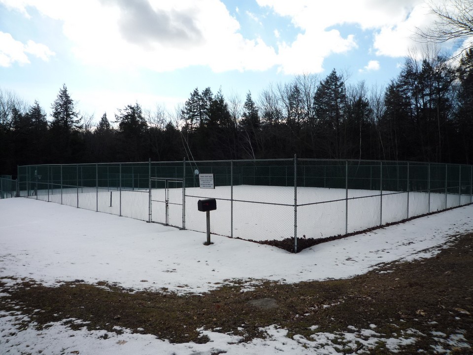 95 Slope Road Tolland, MA 01034 - Photo 18 of 18 a view of a backyard with a fence