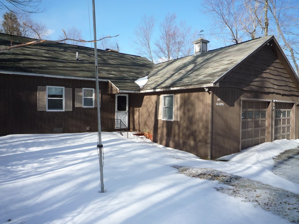 95 Slope Road Tolland, MA 01034 - Photo 4 of 18 a front view of a house