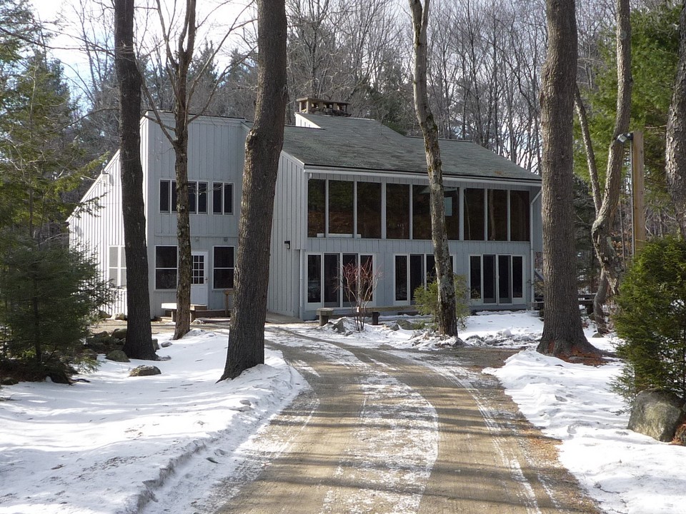 95 Slope Road Tolland, MA 01034 - Photo 5 of 18 a view of a building with trees