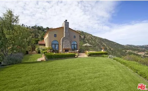 a view of mountain view with mountains in the background