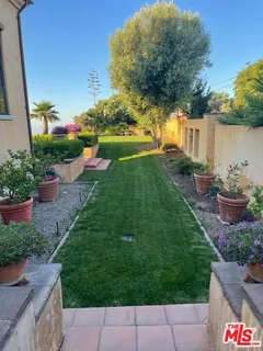 a view of a city and mountains in the background