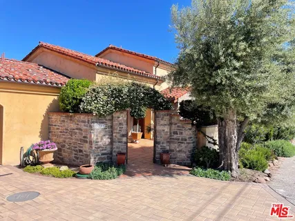 a view of a backyard and a yard