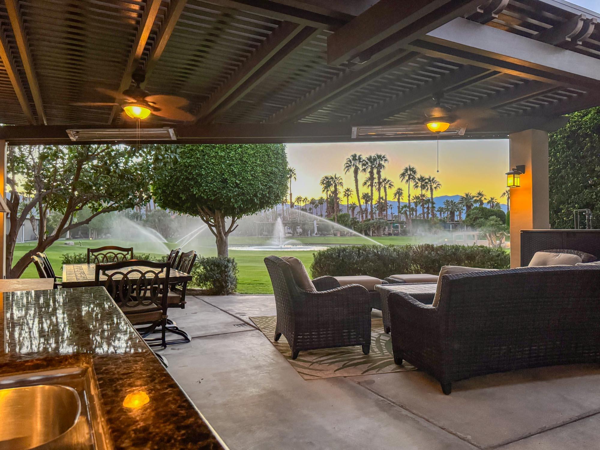 80394 Ave 48, Unit 244 Indio, CA 92201 - Photo 21 of 25 a roof deck with table and chairs