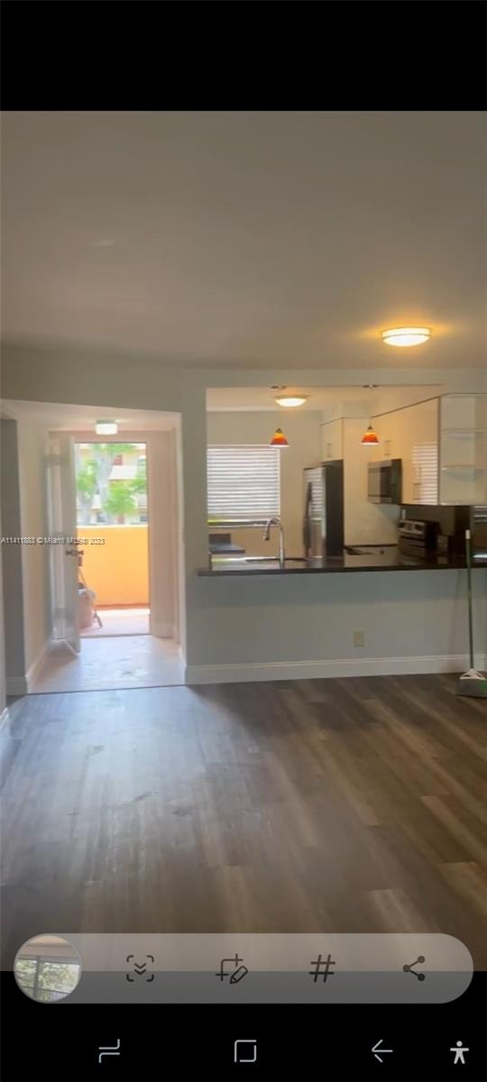 3410 Foxcroft Road, Unit 207 Miramar, FL 33025 - Photo 4 of 18 a view of a living room