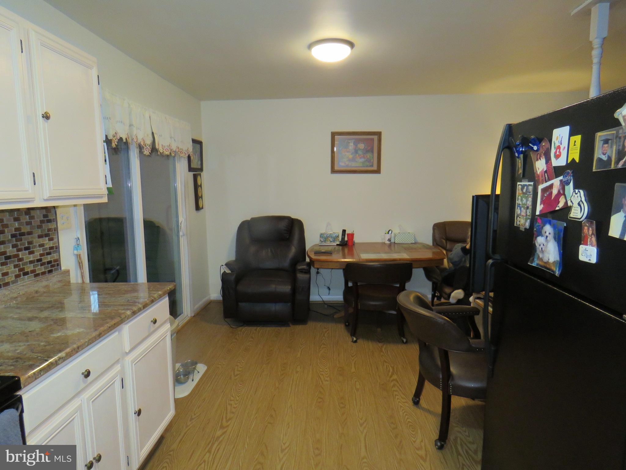 10976 Delaware Avenue Laurel, DE 19956 - Photo 13 of 56 KITCHENAND DINING ROOM