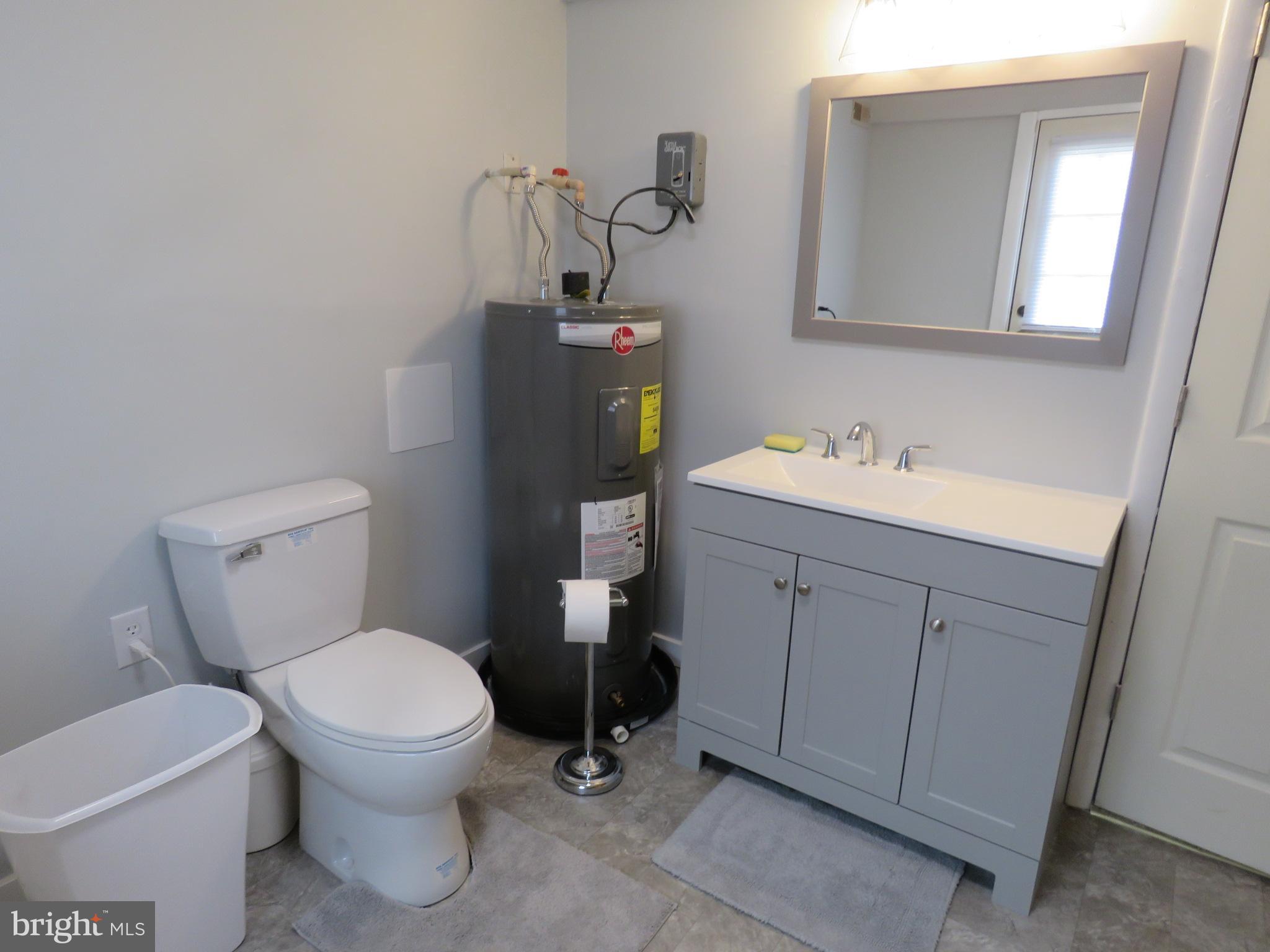 10976 Delaware Avenue Laurel, DE 19956 - Photo 45 of 56 NEW HALF BATH AND UPDATED UTILITY ROOM