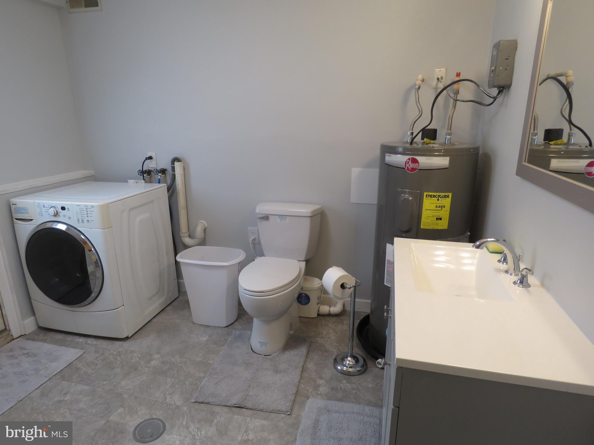 10976 Delaware Avenue Laurel, DE 19956 - Photo 46 of 56 NEW HALF BATH AND UPDATED UTILITY ROOM