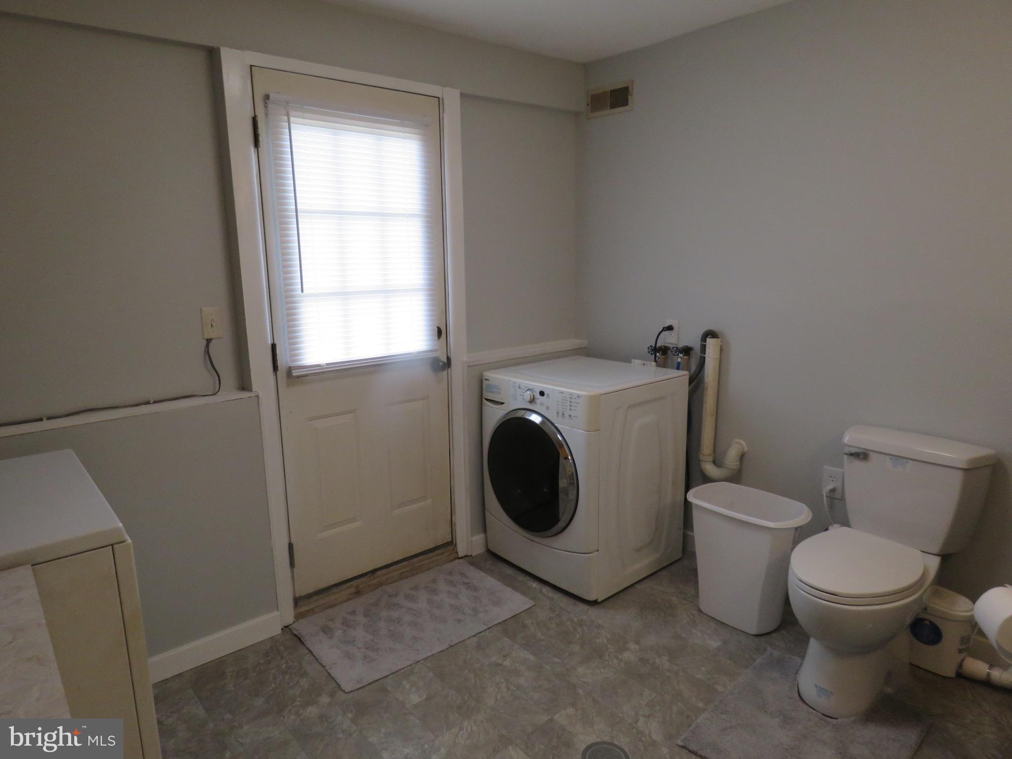 10976 Delaware Avenue Laurel, DE 19956 - Photo 47 of 56 NEW HALF BATH AND UPDATED UTILITY ROOM