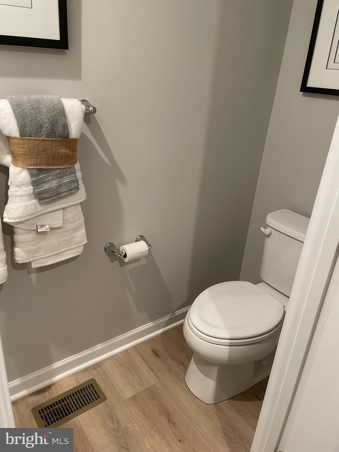 2640 High Point Drive Culpeper, VA 22701 - Photo 12 of 27 a bathroom with a toilet and a vanity