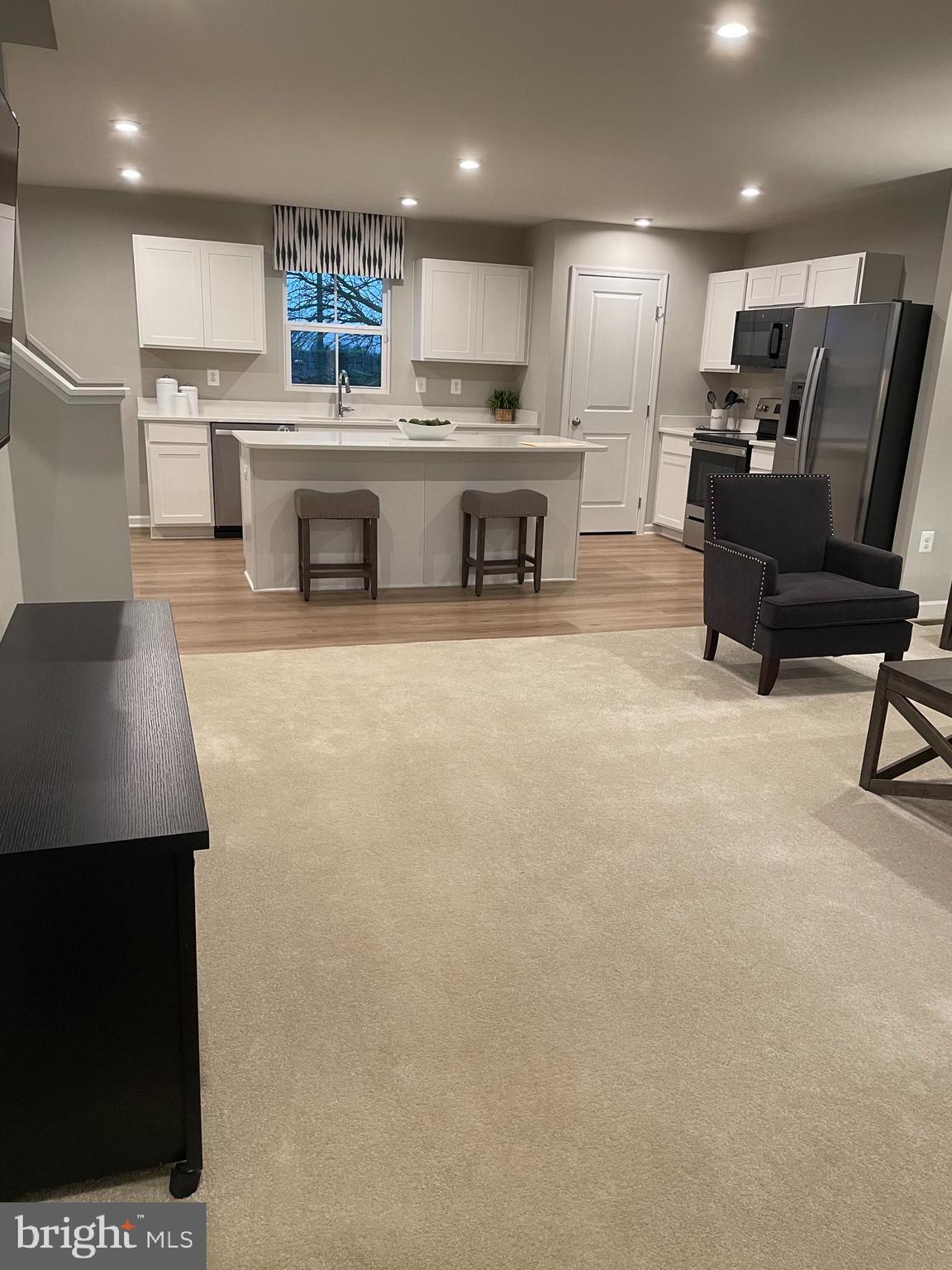 2640 High Point Drive Culpeper, VA 22701 - Photo 8 of 27 a large kitchen with a table and chairs in it
