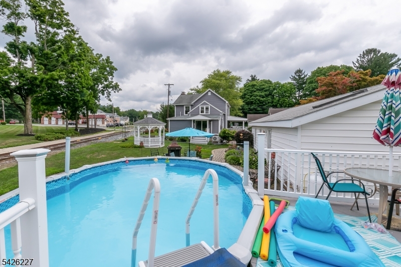 36 Main Street Flanders, NJ 07836 - Photo 43 of 49 a view of a swimming pool with a patio