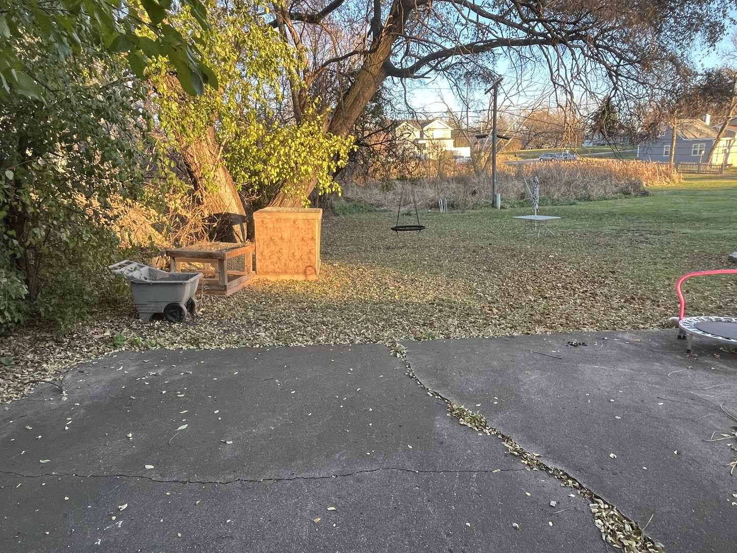 a front view of a house with a yard and fountain