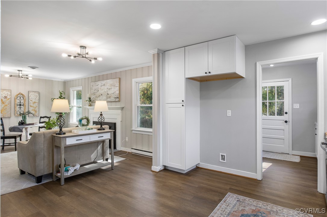 12079 Sunset Drive Ashland, VA 23005 - Photo 13 of 27 a living room with stainless steel appliances kitchen island hardwood floor and living room view