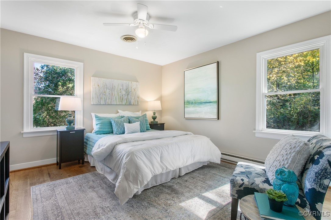 12079 Sunset Drive Ashland, VA 23005 - Photo 15 of 27 a bedroom with a bed and a window