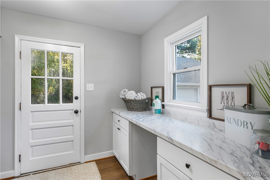 12079 Sunset Drive Ashland, VA 23005 - Photo 22 of 27 a kitchen with granite countertop a sink and a window
