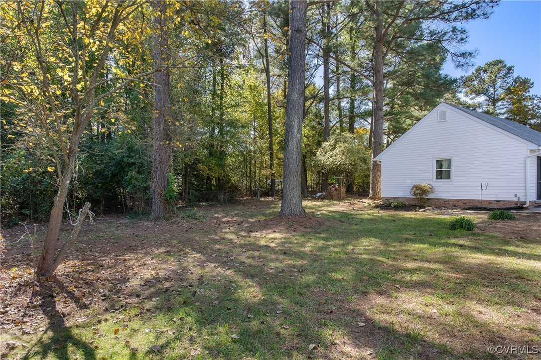 12079 Sunset Drive Ashland, VA 23005 - Photo 26 of 27 a view of a house with a yard