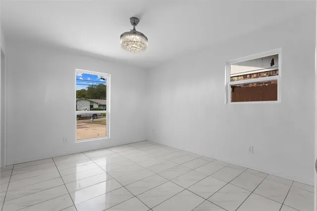 an empty room with windows