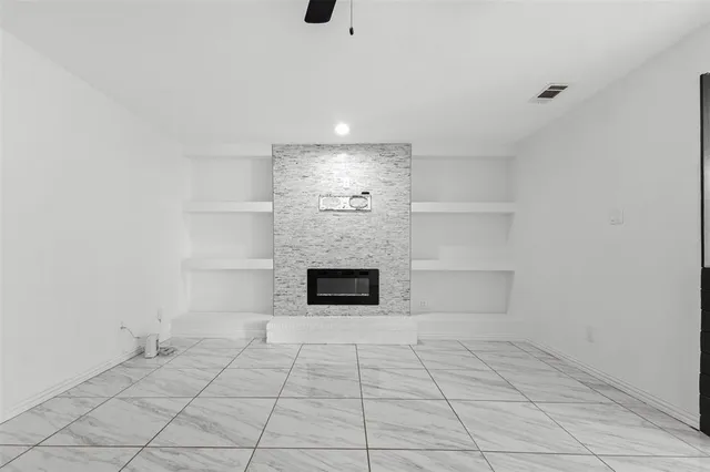 a view of a livingroom with a fireplace