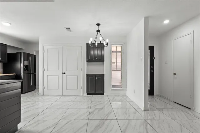 a view of a livingroom with a chandelier
