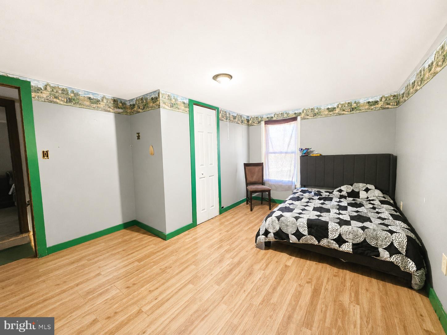 5125 Rhodesdale Road Rhodesdale, MD 21659 - Photo 28 of 50 a bedroom with a bed and a dresser