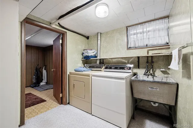 a storage room with washer and dryer