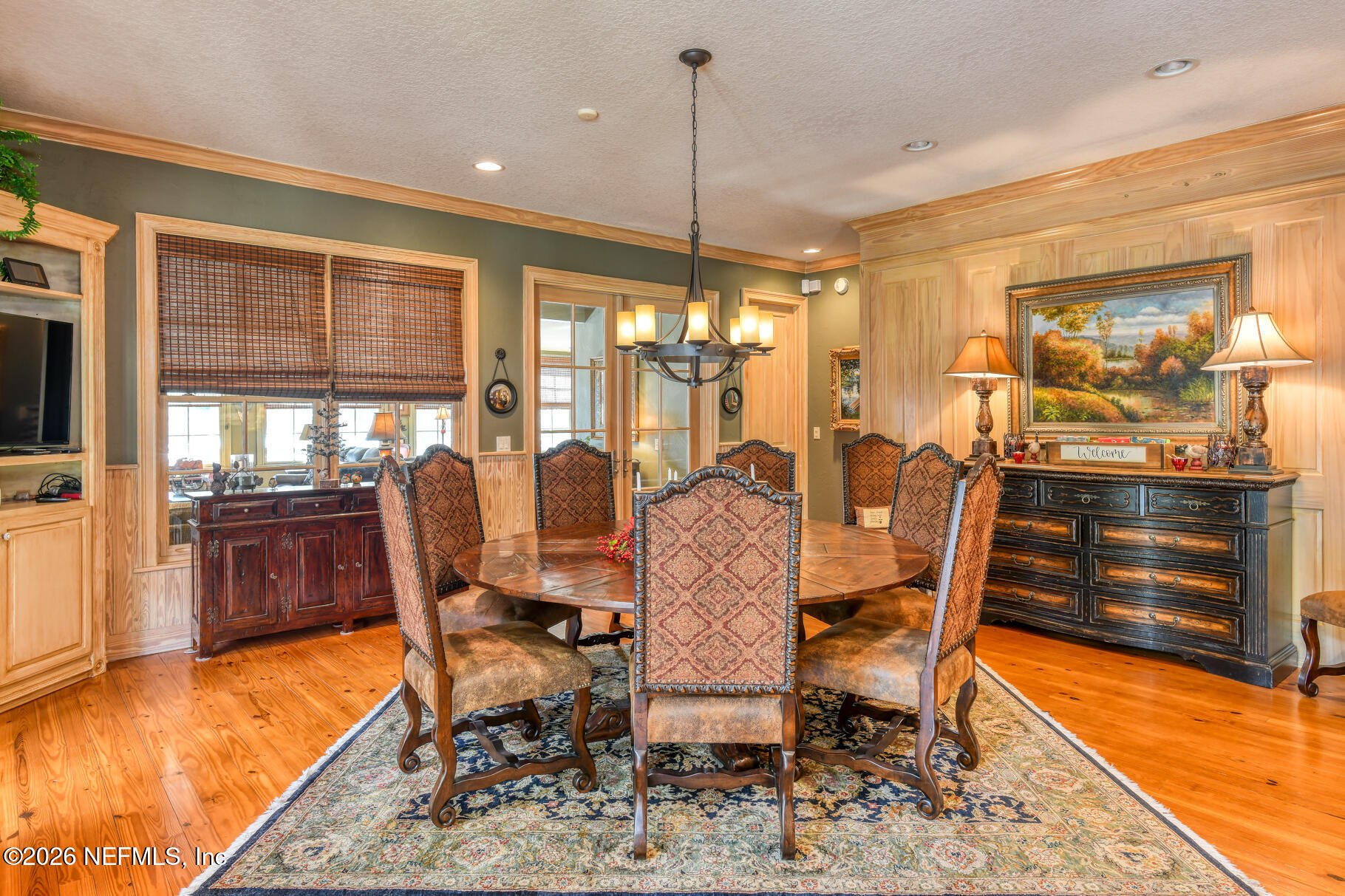 131 Whitney Street Satsuma, FL 32189 - Photo 14 of 75 a view of a dining room with furniture window and wooden floor
