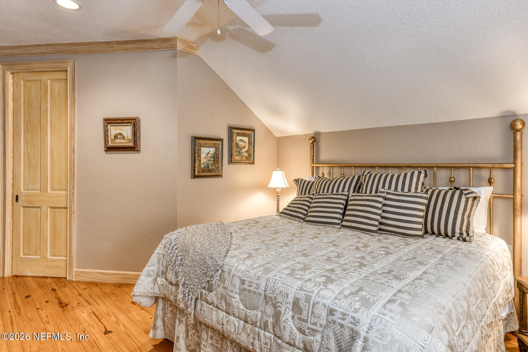 131 Whitney Street Satsuma, FL 32189 - Photo 36 of 75 a bedroom with a bed and a window