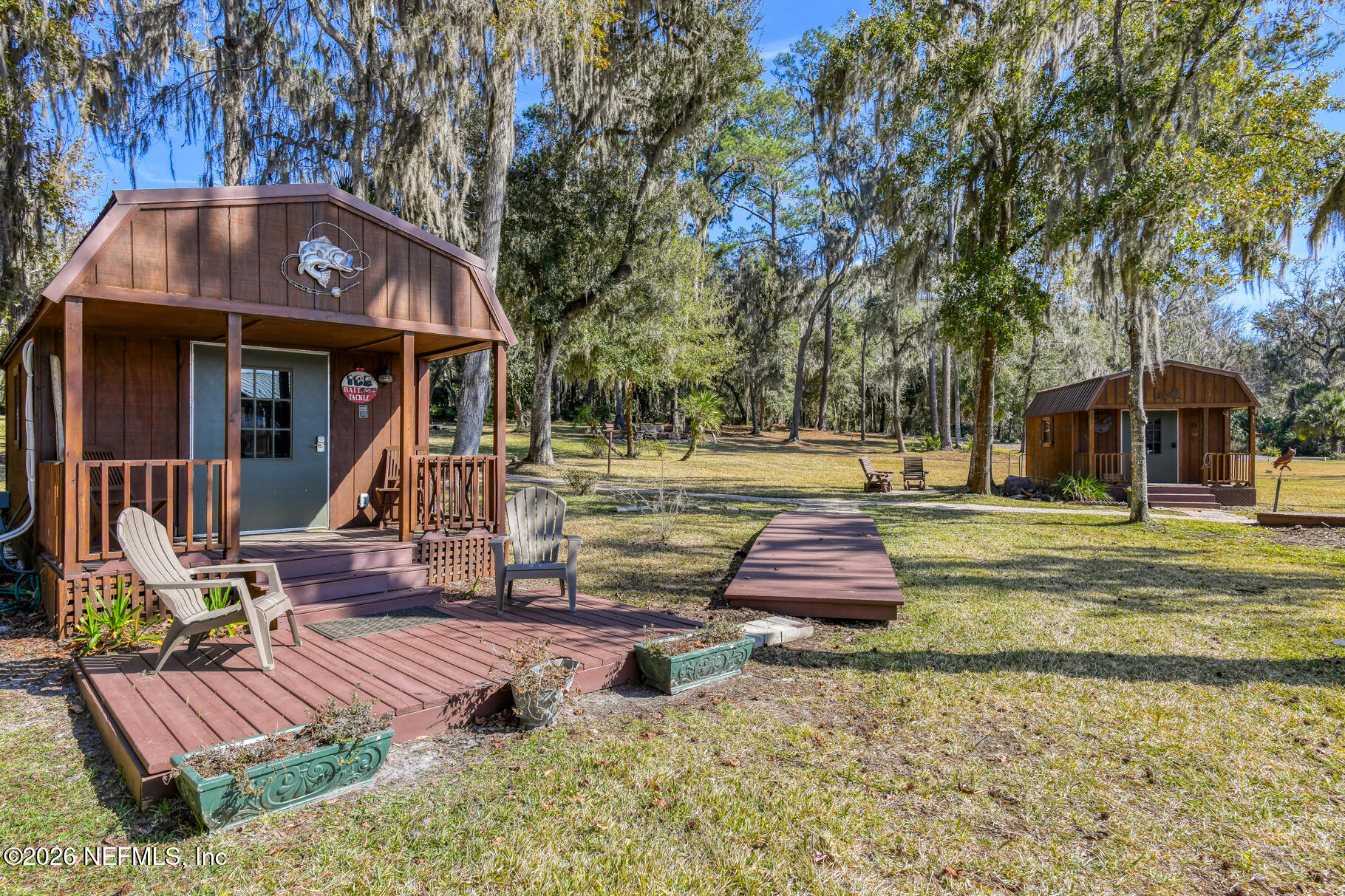 131 Whitney Street Satsuma, FL 32189 - Photo 46 of 75 a front view of house with yard